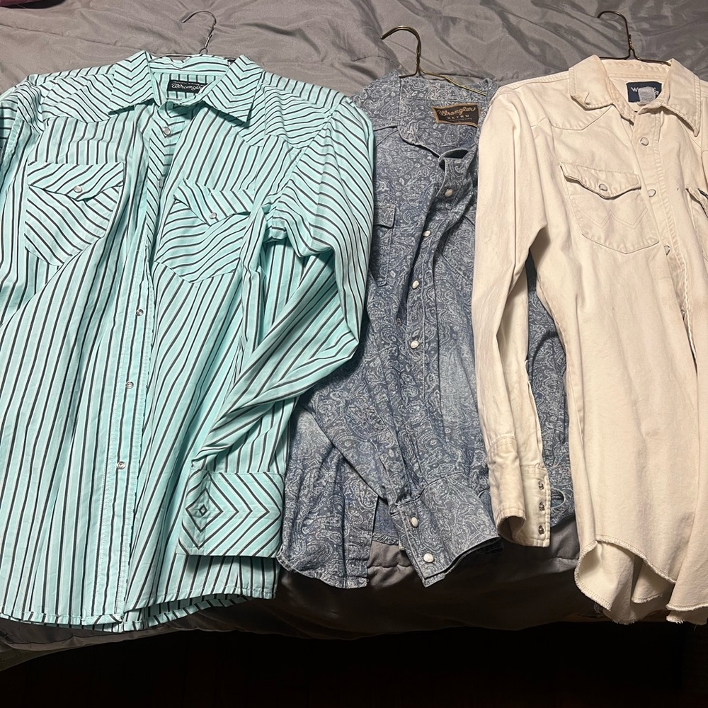 Three wrangler pearl snap shirts